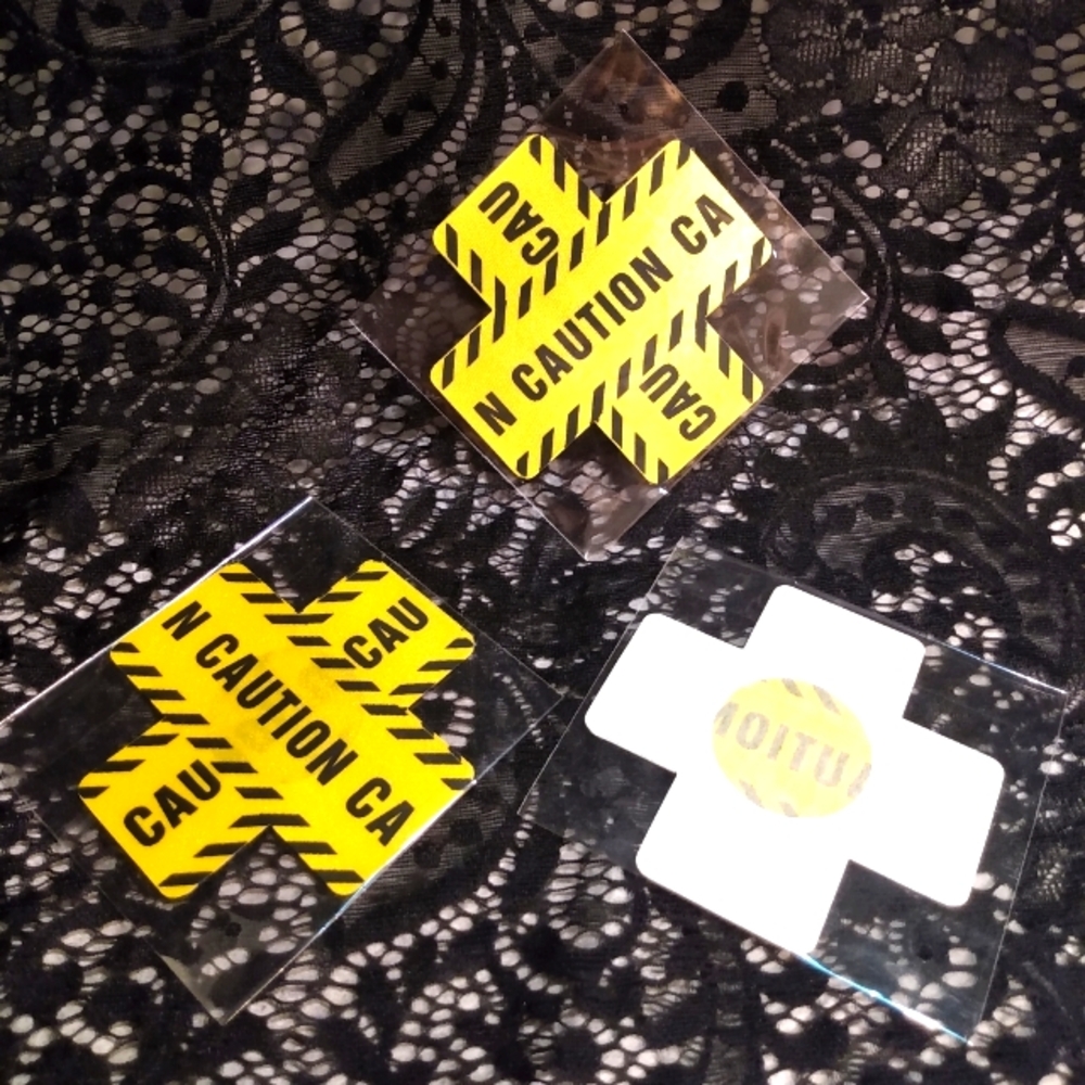 Two Pair Caution Tape Nipple Covers Self Adhesive Pasties